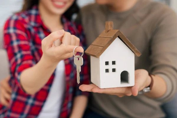 depositphotos 177468314 stock photo proud young asian couple keys